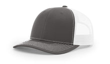 Richardson 112 Trucker Hat in Chocolate and White with structured front, mesh back, pre-curved visor, and adjustable snapback closure.