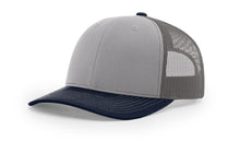 Richardson 112 Trucker Hat in Grey, Charcoal and Navy with structured front, mesh back, pre-curved visor, and adjustable snapback closure.