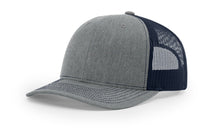 Richardson 112 Trucker Hat in Heather Grey and Navy with structured front panels, breathable mesh back, and adjustable snapback closure.