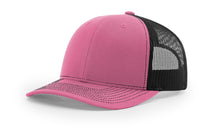 Richardson 112 Trucker Hat in Hot Pink and Black with structured front, mesh back, pre-curved visor, and adjustable snapback closure