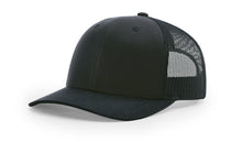 Richardson 112 Trucker Hat in Navy with structured front, mesh back, pre-curved visor, and adjustable snapback closure.