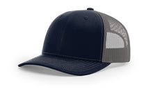 Richardson 112 Trucker Hat in Navy and Charcoal with structured front, mesh back, pre-curved visor, and adjustable snapback closure.