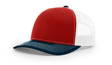 Richardson 112 Trucker Hat in Red, White, and Navy Tri-Color with structured front, mesh back, pre-curved visor, and adjustable snapback closure.