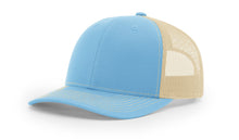 Richardson 112 trucker hat in Columbia Blue and Khaki with mesh back, snapback closure, pre-curved visor, and structured front panels.