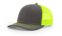 Richardson 112 trucker hat in charcoal and Royal Green , combining modern style with bold color accents—perfect for custom embroidery.
