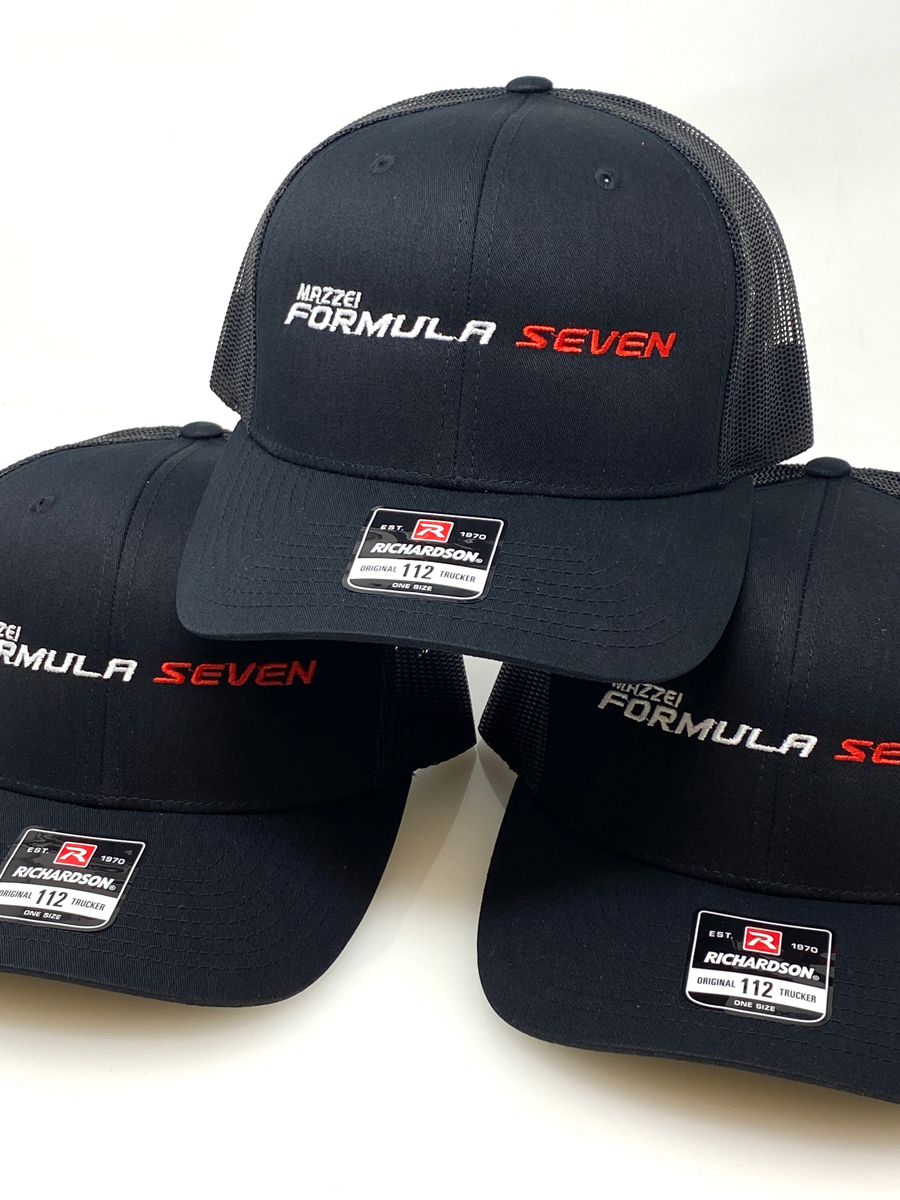 Mazzei Formula Seven custom embroidered black trucker caps with red and silver thread logo, by Presto Embroidery