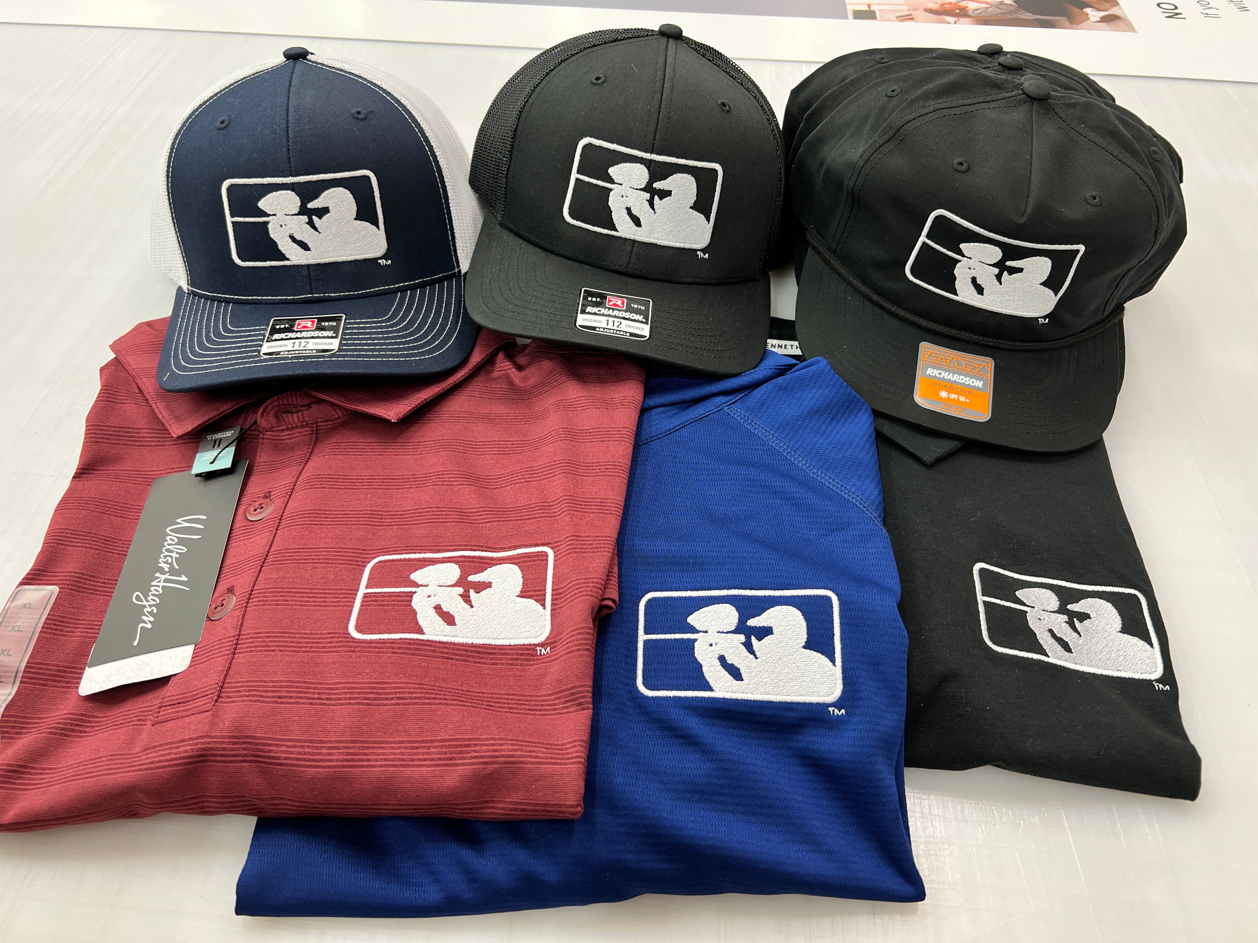 Walter Hagen golf polo shirts and Richardson 112 trucker caps with custom embroidered Walter Hagen logo, run by Presto Embroidery