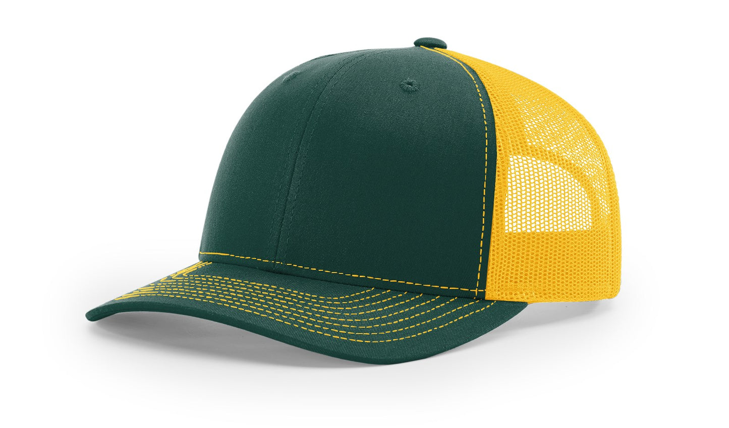 Richardson 112 Trucker Hat in Dark Green and Gold with structured front, mesh back, pre-curved visor, and adjustable snapback closure.