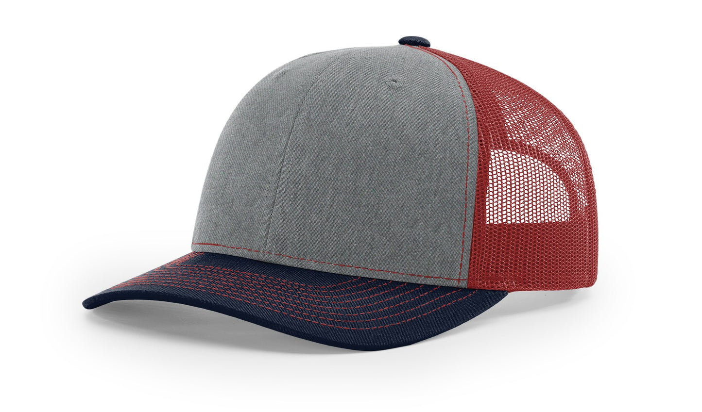 Richardson 112 Trucker Hat in Heather Grey, Cardinal, and Navy with structured front, mesh back, and adjustable snapback closure.