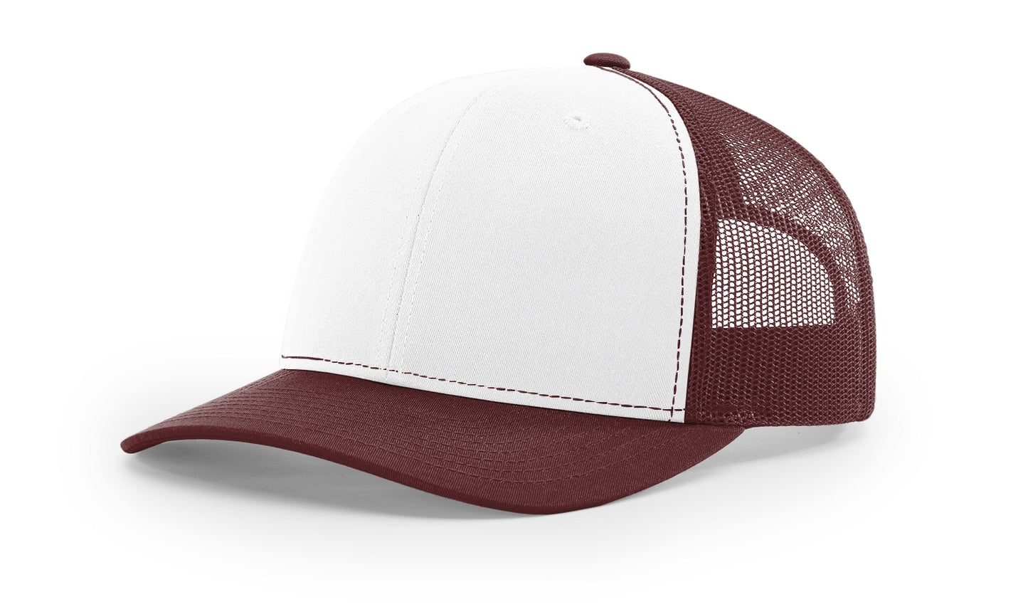 Richardson 112 Trucker Hat in White and Maroon with structured front, mesh back, pre-curved visor, and adjustable snapback closure.